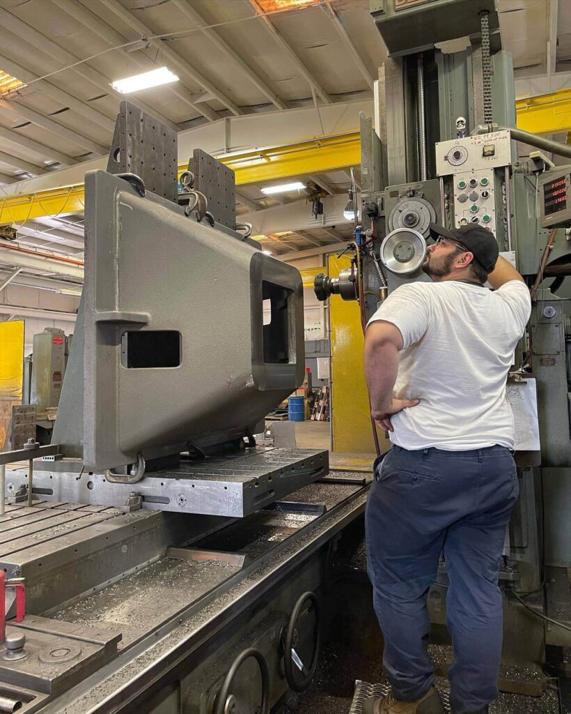 Man working on a machined part