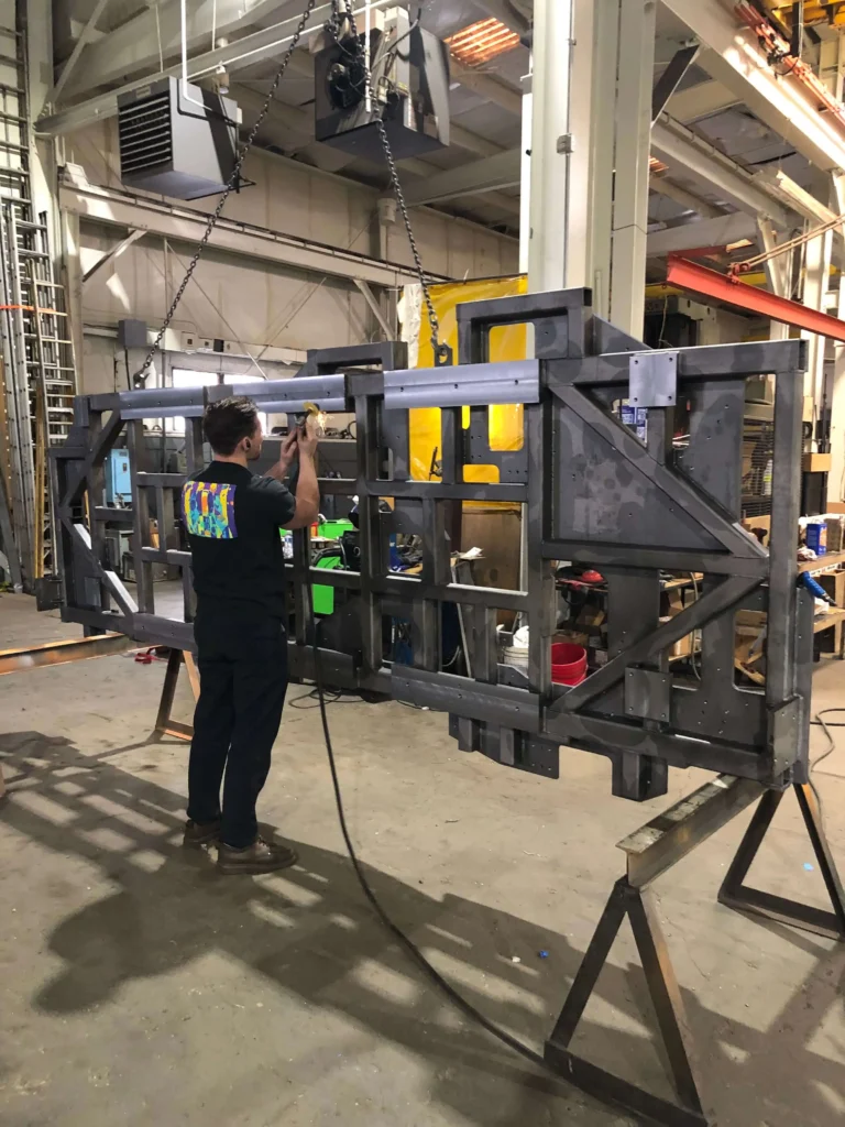 Man working on machined part